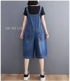 Cotton-polyester denim jumpsuit featuring comfortable loose fit and playful retro suspender details