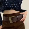 Vintage wide belt for women in faux leather with metal buckle, perfect for casual or formal wear in black, brown, or red.