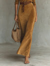 Close-up of the soft suede texture of the Autumn Whispers dress, showcasing its luxurious feel.