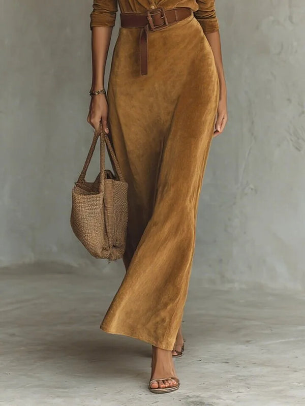 Close-up of the soft suede texture of the Autumn Whispers dress, showcasing its luxurious feel.