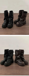 Chic women's mid-calf biker boots with buckle detail, cozy plush lining, and durable rubber sole for stylish winter wear.
