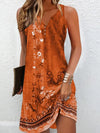 Summer mini dress showcasing delicate beadwork and breathable polyester blend construction
