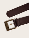 Vintage wide belt for women in black faux leather with metal buckle, perfect for casual or formal outfits.