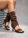 Summer-ready open-toe boots with mid-calf height and stiletto heel