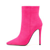 Elegant pointed toe suede boots with thin high heels.