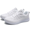 Women's lightweight white sneakers with multi-color trim and rubber sole