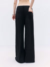 Relaxed unisex pants in Y2K aesthetic with hollow design elements and adjustable drawstring waist for comfort