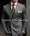 Model wearing a sleek double-breasted suit, exuding confidence at a wedding.