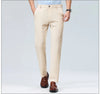 Professional wearing breathable business pants transitioning from office to outdoor meeting
