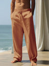 Relaxed fit linen pants in khaki with practical pockets and flowing legs
