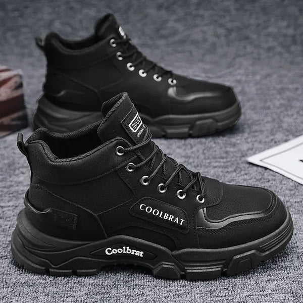 Black suede Winter Vanguard boots with rubber outsole for urban explorers.