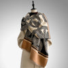 Elegant dual-tone scarf showcasing a luxurious cashmere-like texture.
