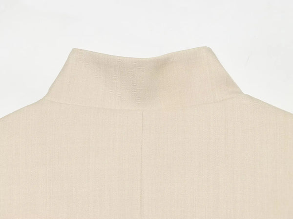Contemporary outerwear blazer featuring distinctive stand collar