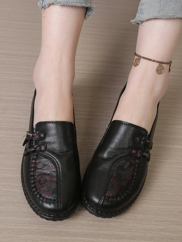 Brown leather loafers with secure anti-slip sole and feminine floral touch