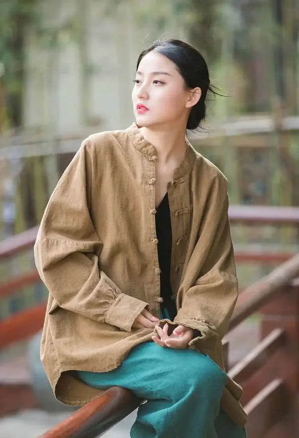 Minimalist cotton-linen outerwear with elegant stand collar and versatile styling