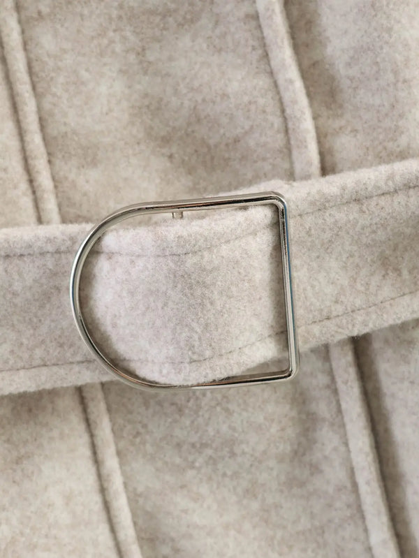 Autumn jacket featuring structured collar and waist-defining belt detail