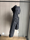 Hooded zip-front jacket with windproof fabric and moisture-repellent outer layer