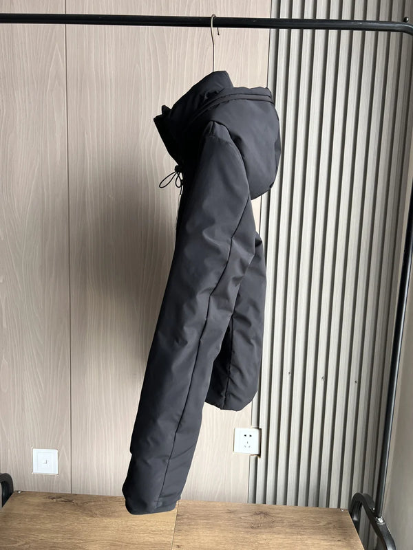 Hooded zip-front jacket with windproof fabric and moisture-repellent outer layer