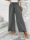 Floral wide-leg chiffon pants for women, ankle-length, elastic waist, perfect for summer fashion and casual chic outfits.
