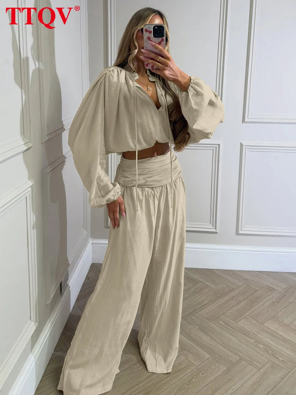 Two-piece woven set featuring comfortable loose silhouette and timeless design