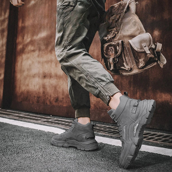 Winter Vanguard boots on icy sidewalk, highlighting weather-resistant features.