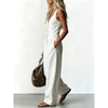 Effortless Escape denim jumpsuit featuring flattering V-neckline and flowing wide leg silhouette