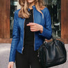 Chic slim fit faux leather moto jacket for women, perfect for autumn and winter, featuring a sleek zipper closure and tailore
