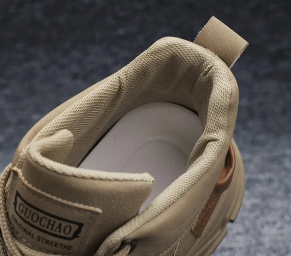 Close-up of stitching details on black suede Winter Vanguard boots.