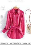 Chic women's sheepskin leather jacket with turn-down collar, lace-up belt, and adjustable waist for a stylish fit.