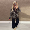 Classic Fair Isle cardigan with adjustable tie waist in printed design