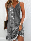 V-neck pullover dress featuring artisanal beadwork and free-spirited bohemian design