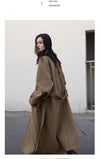 Sophisticated belted coat with warm turtleneck and luxurious wool blend