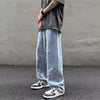 Blue wide-leg jeans for men, featuring a sturdy denim construction.
