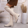 Chic over-the-knee women's winter boots with flannel upper, pointed toe, and square heel for stylish cold weather wear.