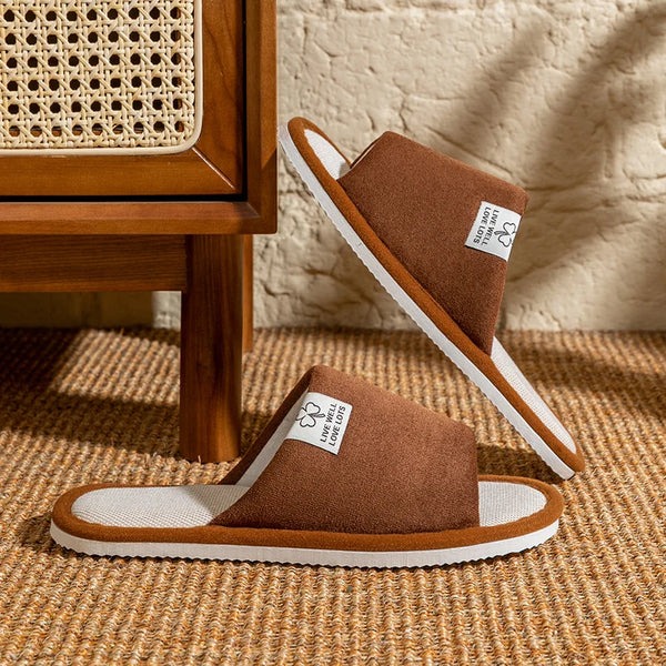 Side view of flat heel linen slippers with barefoot-inspired design