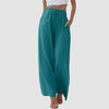 Breathable cotton-linen blend pants featuring wide-leg design and functional strap accents