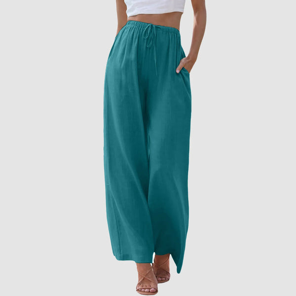 Breathable cotton-linen blend pants featuring wide-leg design and functional strap accents