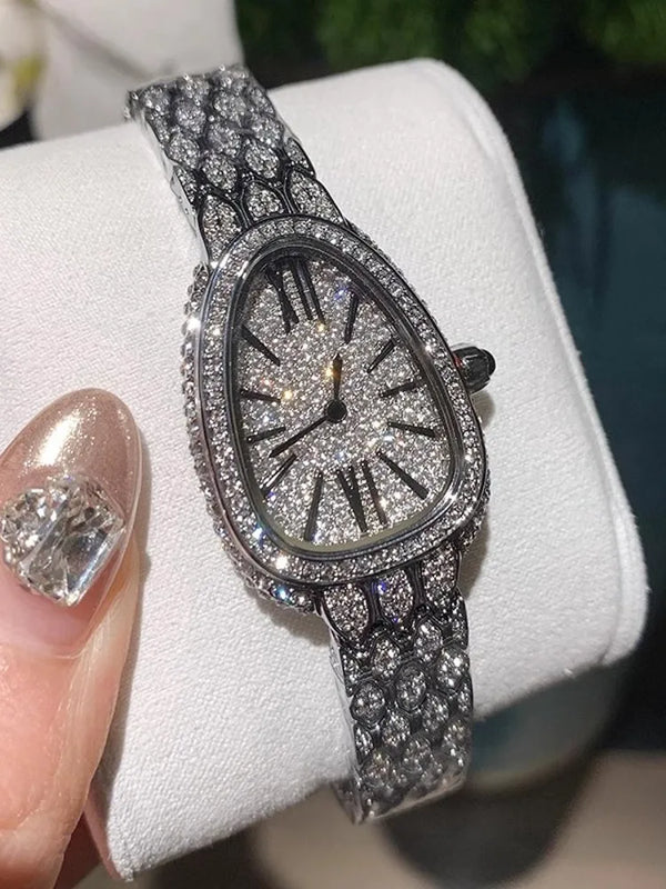 Elegant diamond-studded watch showcasing precision craftsmanship and luxury.