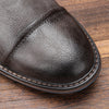 Genuine leather ankle boots for men featuring convenient zipper and low heel