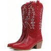 Pair of knee-high western boots with embroidery and stable block heel for all-day comfortable wear