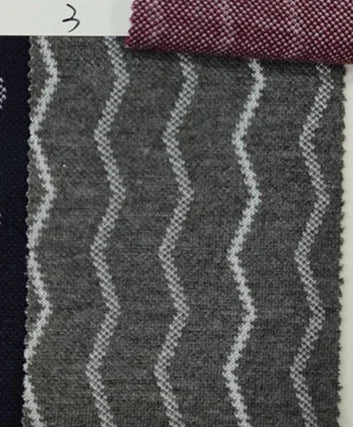 Model wearing the elegant striped men's wedding suit at a formal event.