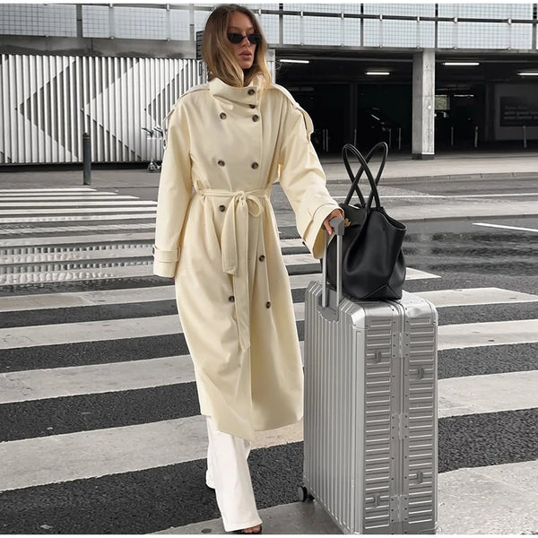 Sophisticated cream trench coat displaying quality polyester fabric construction