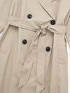 X-long trench coat showing graceful movement and dramatic flowing silhouette