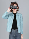 Chic women's sheepskin leather jacket with zippered front, turn-down collar, and pockets for stylish autumn layering.