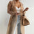 Sunshield belted trench coat in sheer lightweight polyester with adjustable waist tie