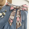 Chic fabric belt for women with geometric design, versatile for dresses, jeans, or as a scarf and headband accessory.