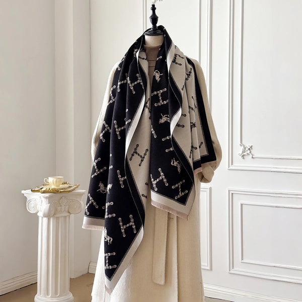 Luxe cashmere shawl in vibrant floral print, perfect for winter elegance.