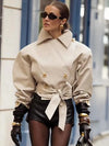 Belted trench coat in British style with classic button details