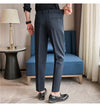 Men's slim fit dress pants in British style with elastic waist, perfect for formal and casual occasions, made from polyester