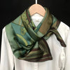 Vintage-inspired green satin scarf for women, soft and lightweight fabric.